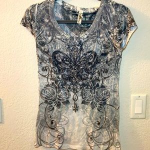 Fleur de les embellished tee.